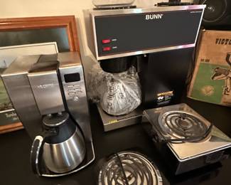 Here is a great like new Mr. Coffee, coffee maker, three terrific hot plates, but the best thing in this picture is that two burner bun coffee make! It’s brand spanking new and I took it right out of the box!