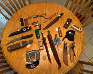 This is a great table of knives in assorted sizes, duck holes, turkey holes, and more!