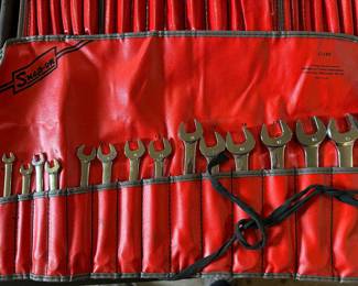 This is a set of Snap-On combination wrenches in a red roller pouch! It is complete and they are an excellent condition, like new!