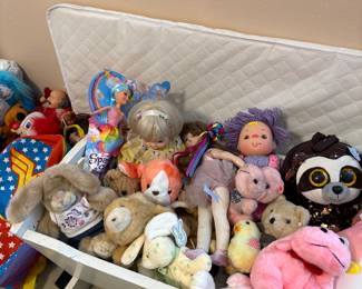 Variety of Vintage plush and dolls