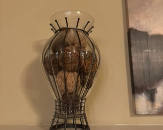 Large glass and wrought iron vase