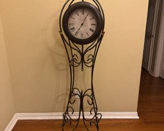 Scrolled standing clock 
