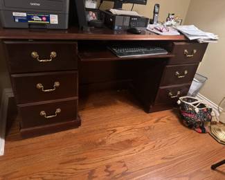 Pretty, traditional desk with slide out keyboard tray