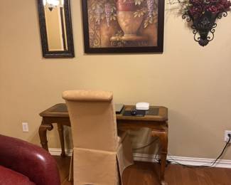 Sofa table with glass inserts, wall art