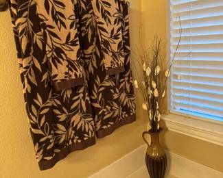 Brown and taupe towels and bath decor