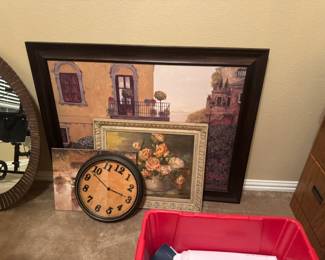 Framed artwork and clocks