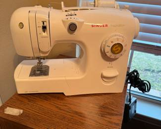 Singer sewing machine with case