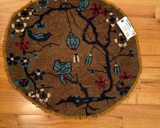round oriental rug, hand oven
