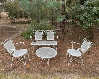 Mid century wrouhgt iron mesh patio bench/loveseat, 2 chairs and table in great condition