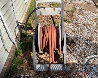 Outside - back yard - hose reel with hose