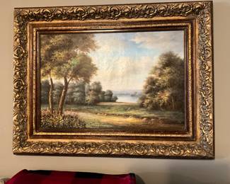 Oil painting with ornate frame in Living Room
