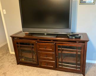 TV stand in bedroom