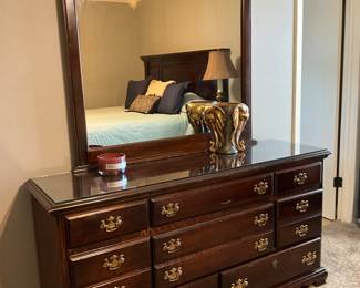 Dresser with mirror in bedroom