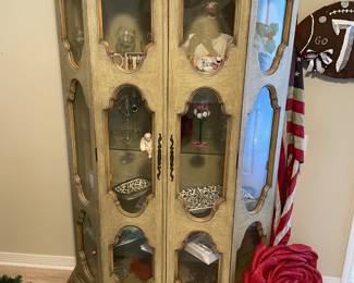 Regency style lighted display cabinet, glass shelves.  $250