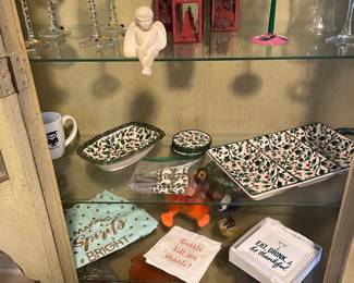 Regency style lighted display cabinet, glass shelves.  $250