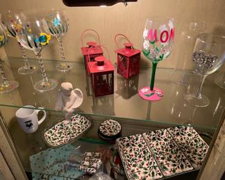 Regency style lighted display cabinet, glass shelves.  $250