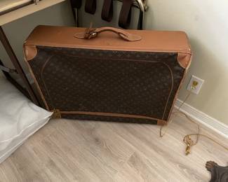 Vintage LV luggage. $50
