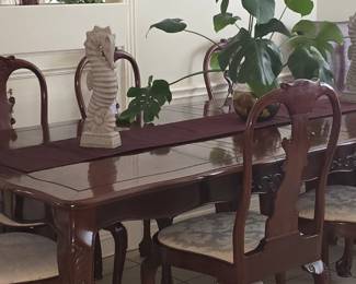 Mahogany Dining Table with 6 Chairs and 3 Leaves. This is a picture with 2 leaves in.
