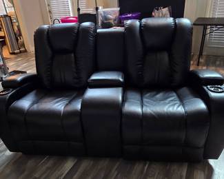 Very Nice Black Leather Electric Loveseat - The family was going to keep them but they decided to sale them.