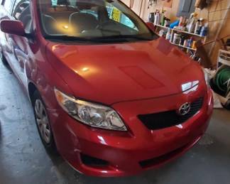 The white paint has been removed from the front right fender. It is not scratched or dented.