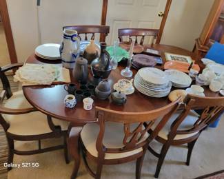 walnut dining room table with 6 chairs