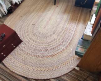 braided area rug, hardwood windsor side chair,