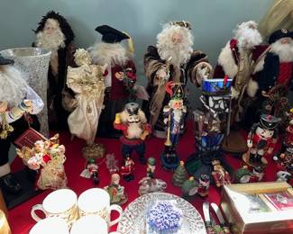 Many Old World cloth santas.