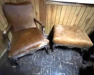 Old Hickory Tannery chair and ottoman made from animal hide.