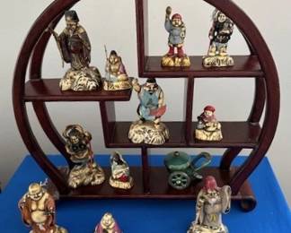 Collection of resin Japanese figures.