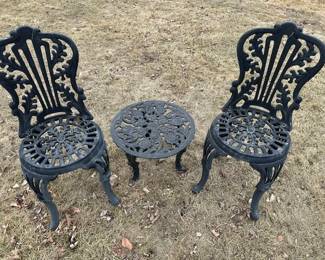 Vintage cast iron side chairs and side table.