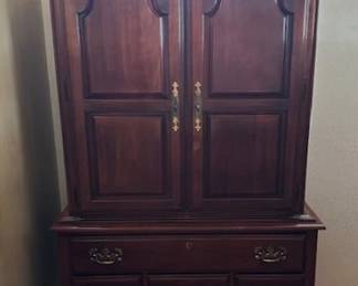 #135 American Drew Chippendale style wardrobe/armoire.