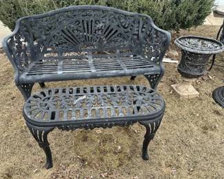 Vintage cast iron settee, table and planter.