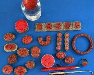 Chinese red lacquer cinnabar brooches, pill boxes, bracelets, egg, pen and book mark.
