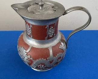 Chinese Yixing  ceramic tea/creamer pitcher with pewter overlay.