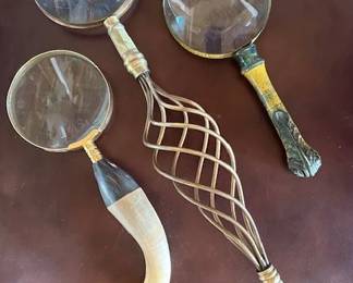 Antique hand held magnifying glasses.