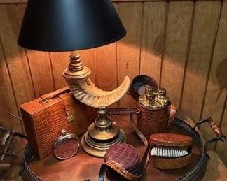 Vintage Chapman Ram's horn brass lamp, vintage men's travel toiletries kit., triple flask, clothing brush, and jewelry traveler.