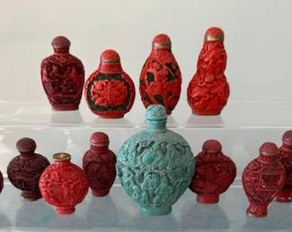Chinese red lacquer cinnabar snuff bottles.