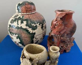 Glazed ceramic geographical features, and soapstone vases.