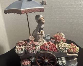 Lladro "Flowers of the Season" woman sculpture.