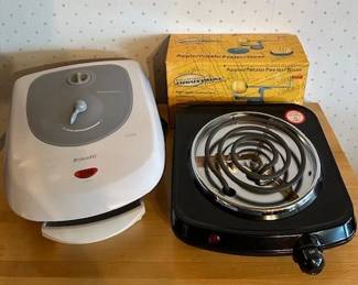 New Brevetti waffle maker, hot plate and apple/potato peeler.