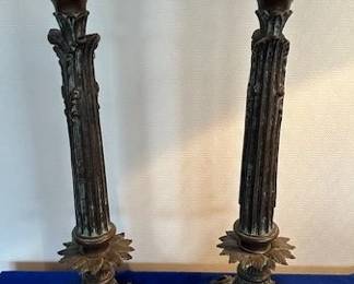2 antique bronze candlesticks.