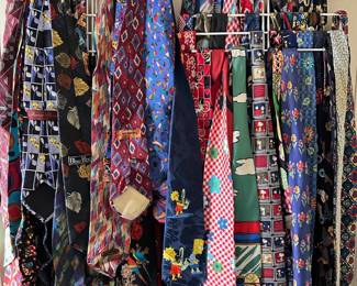 Over 100 Ties On 2 Vintage Metal Tie Racks
Lot #: 104