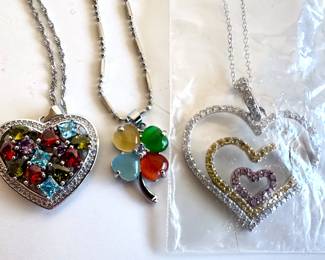 18K White Gold Shamrock Necklace & 2 New With Tags Sterling Silver Heart Necklaces
Lot #: 173