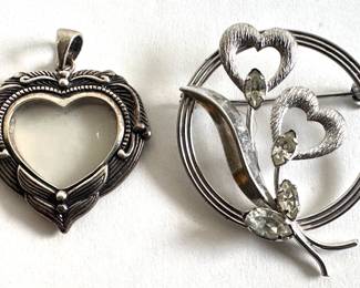 
Sterling Silver Heart Pendant With Room For Photo From Thailand & Star Art Sterling Silver Heart Brooch Pin
Lot #: 124