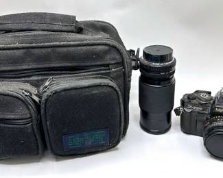 Minolta X-700 SLR Camera, Macro Zoom Lens & Camera Bag
Lot #: 94