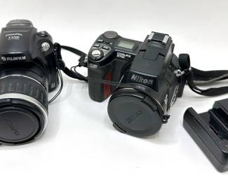 2 Digital Cameras: Fuji Film FinePix S5200 & Nikon Coolpix 8700 With Battery Charger
Lot #: 93