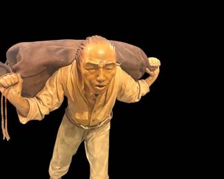 Artist: Liu Miao Chan (leather/wood sculpture)