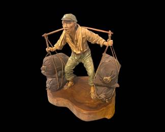 Artist: Liu Miao Chan (leather/wood sculpture)