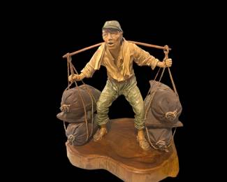 Artist: Liu Miao Chan (leather/wood sculpture)