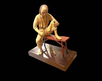 Artist: Liu Miao Chan (leather/wood sculpture)